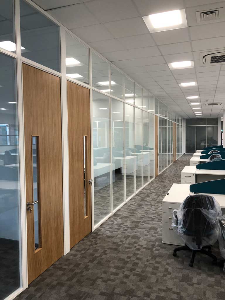 Glass Partition Transformation for Icon Aerospace Image 1