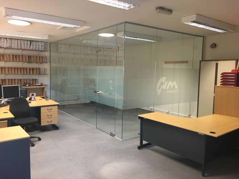 Frameless Glazed Partitions for NM Group Image 1