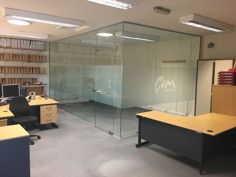 Frameless Glazed Partitions for NM Group